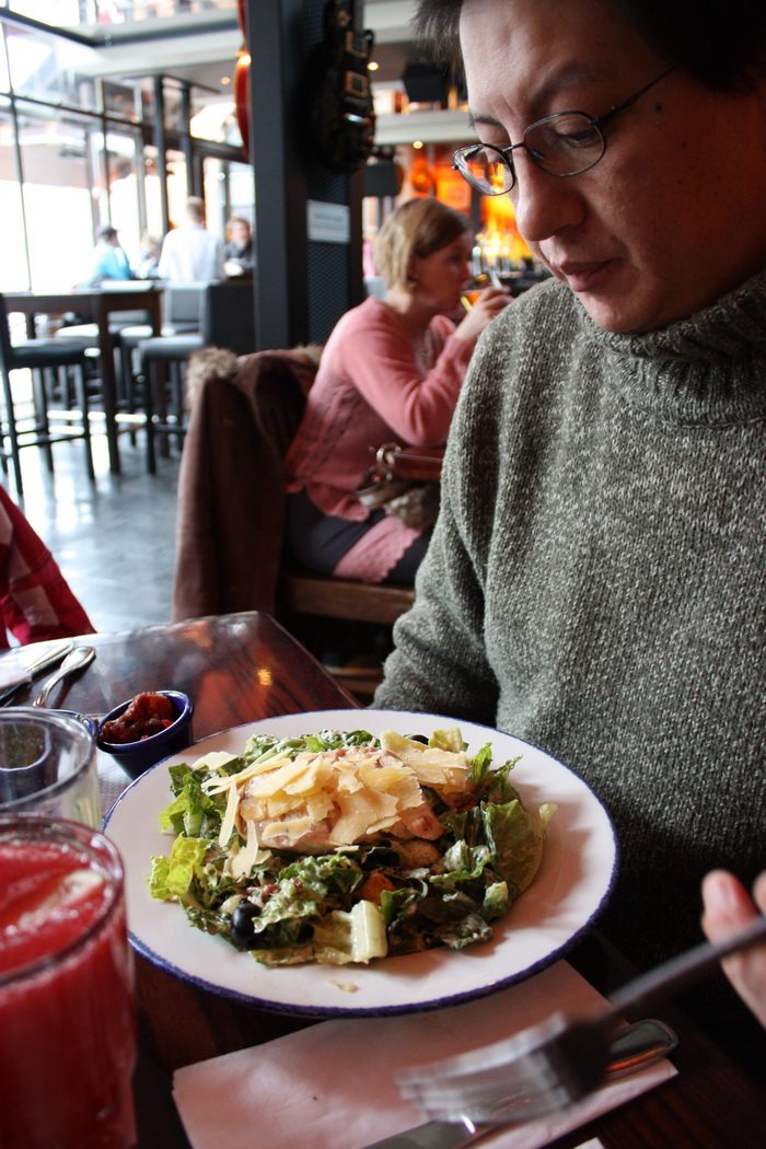 dad eating Caesar salad at hard rock cafe copehagen