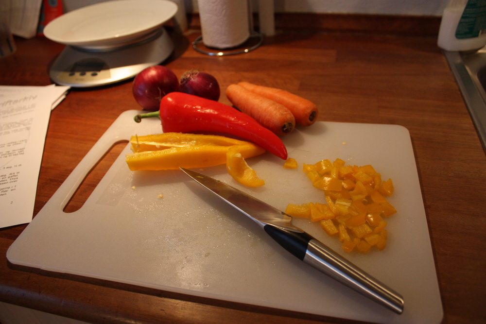 chopping vegetables for lasagne