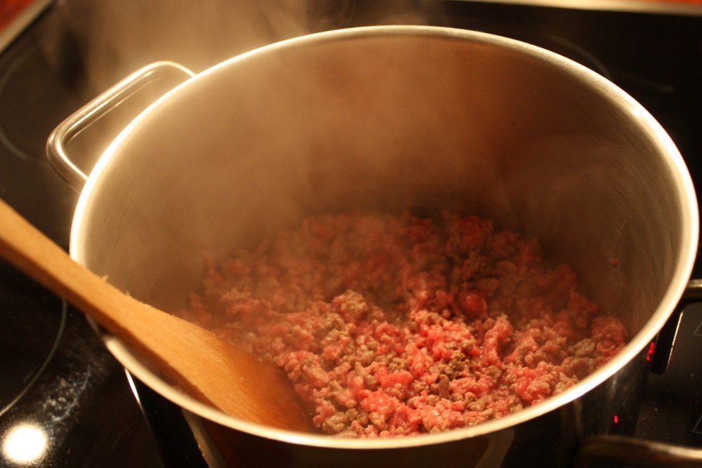 minced beef for lasagne in pot