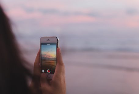 Girl holding phone filming