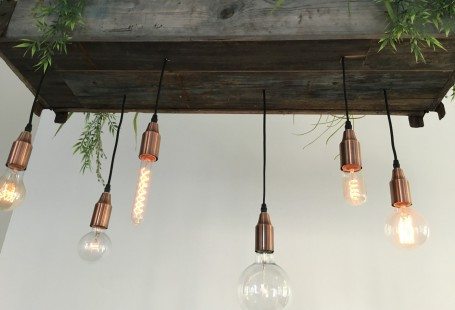 light baubles in a wooden box in the ceiling