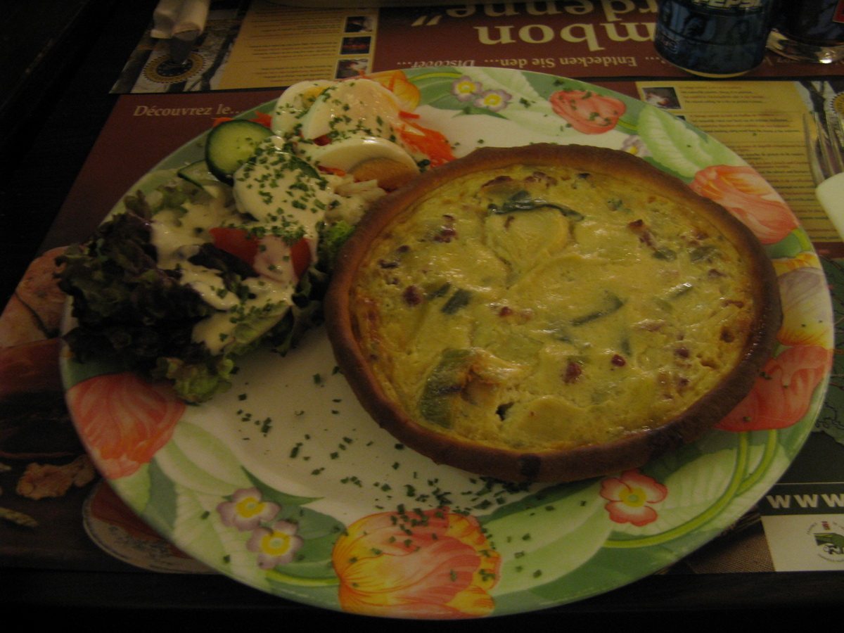 eating a quiche lorraine in bastogne