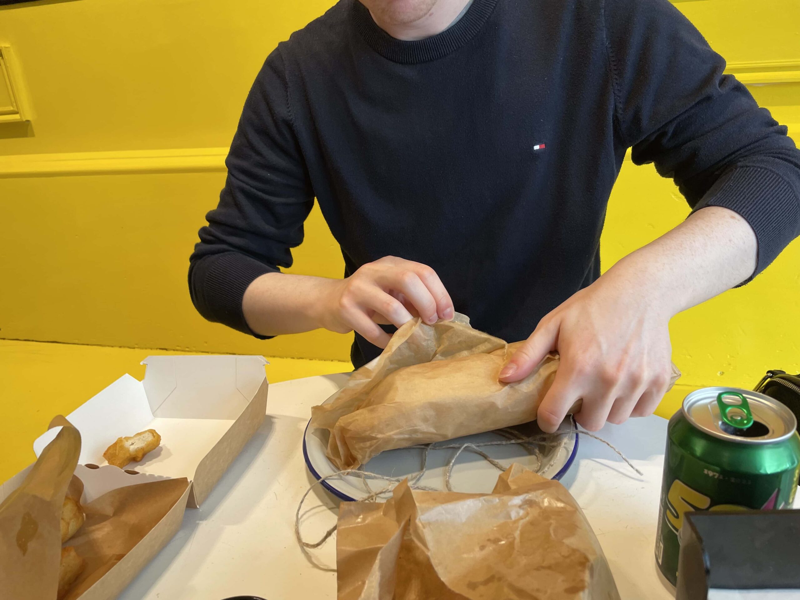 Matt eating a chicken wrap lola chicken wrap