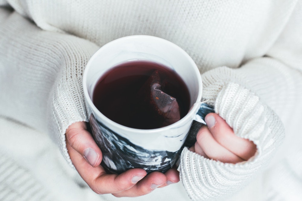 cup of tea and hands