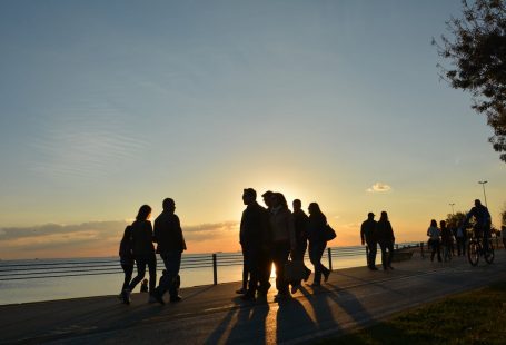 People walking near ocean